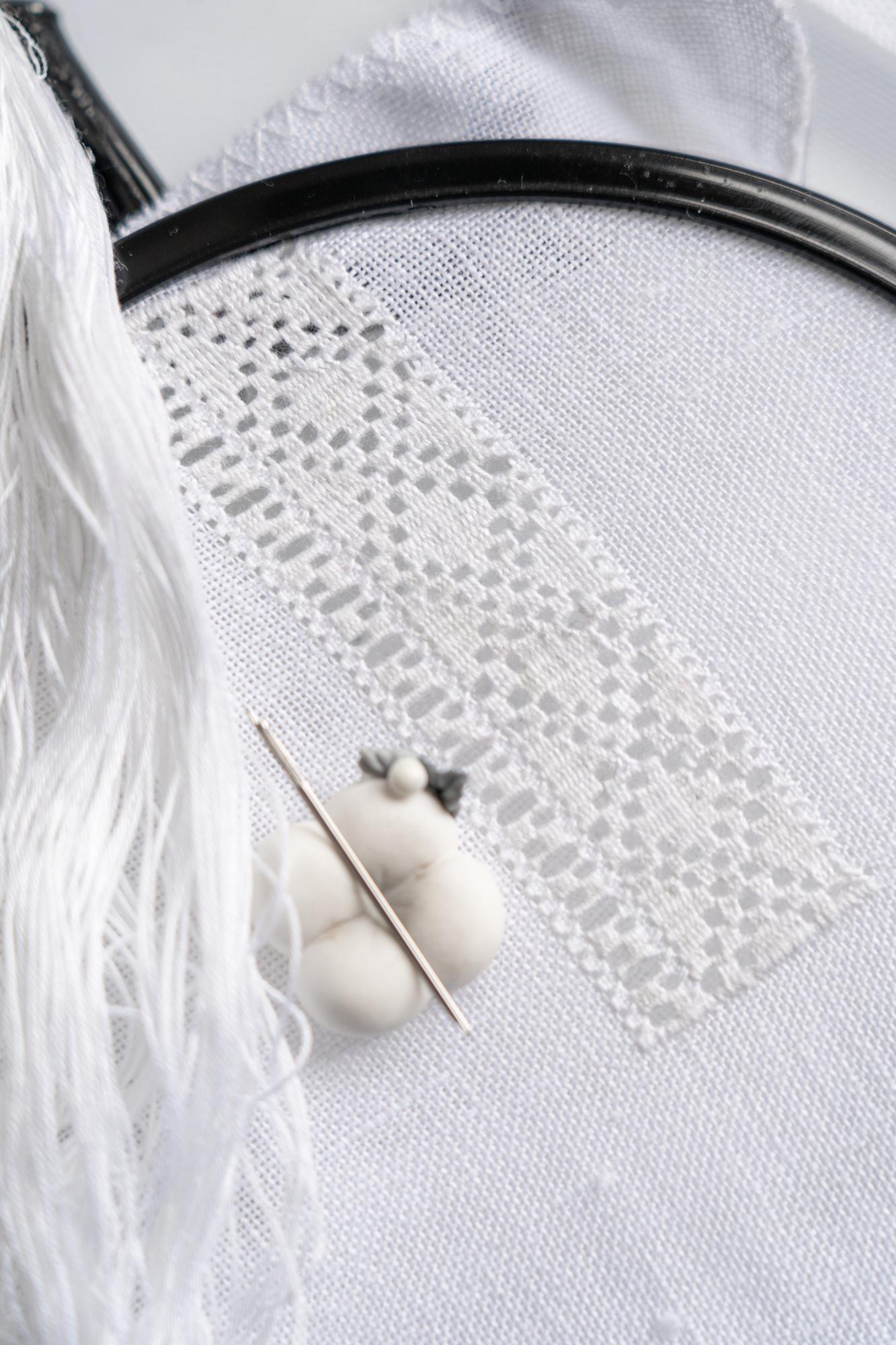 Elegant embroidered sample on linen